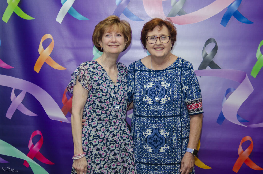 support our work - clients and families took pictures together at the 2025 celebration of life event